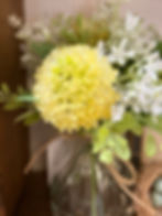 8.25" x 7.5" arrangement of 3 yellow chrysanthemums & foliage in a glass vase