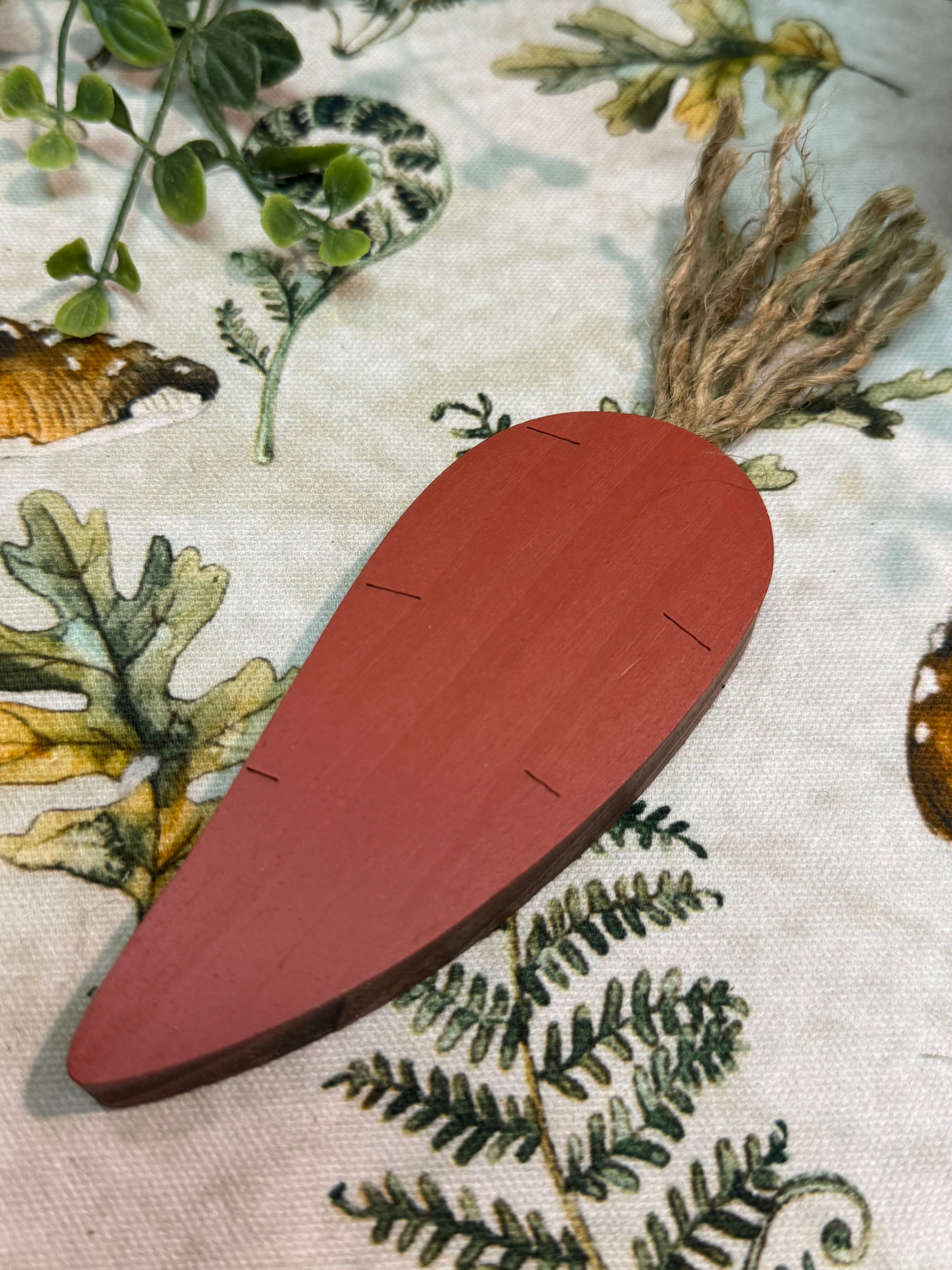 Set of 6 orange wood carrots with frayed jute tops, 3 small 2” carrots, 3 large 7” carrots