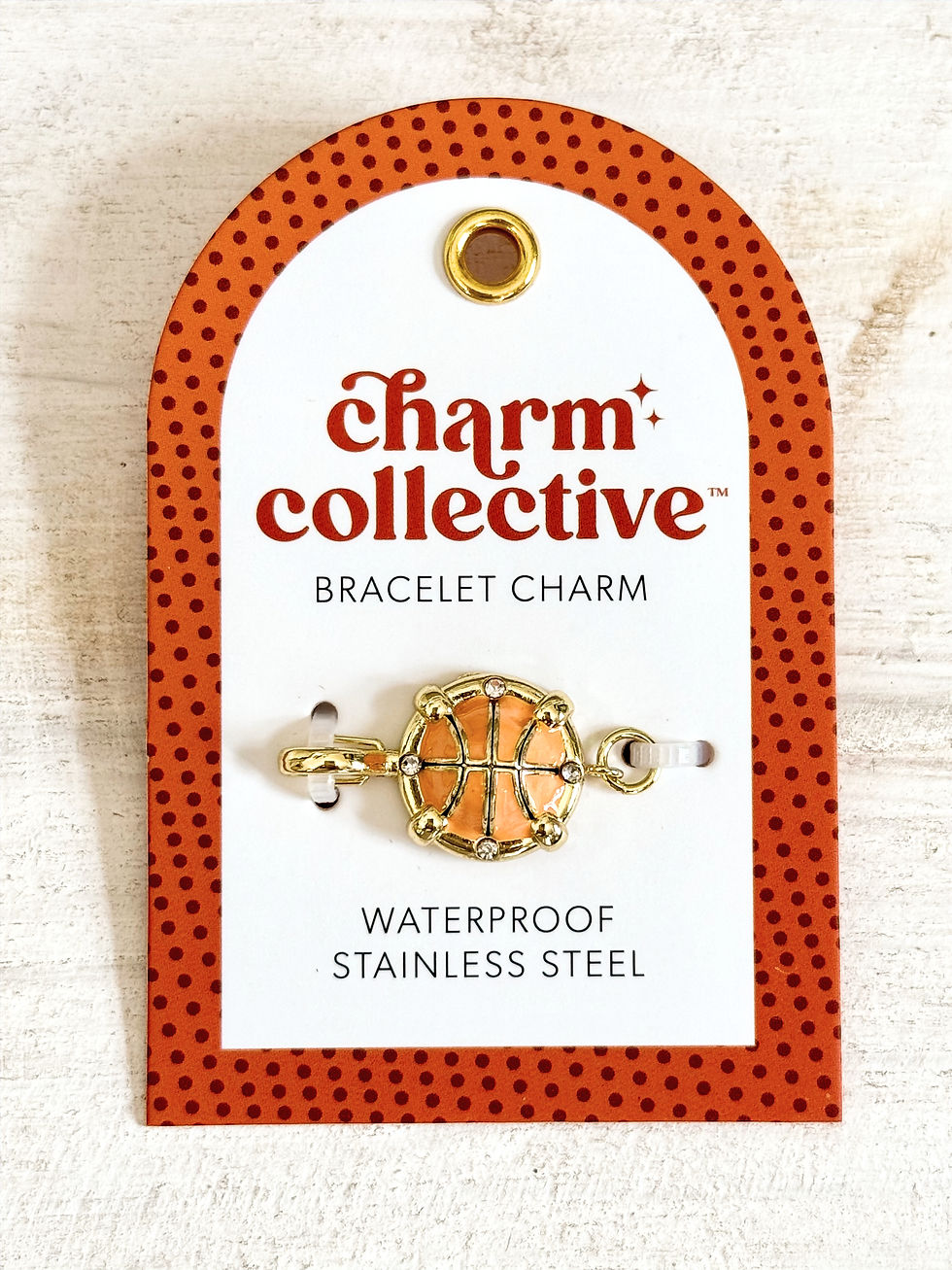 waterproof stainless steel bracelet charm of a basketball, use with the charm collective collection to build a bracelet