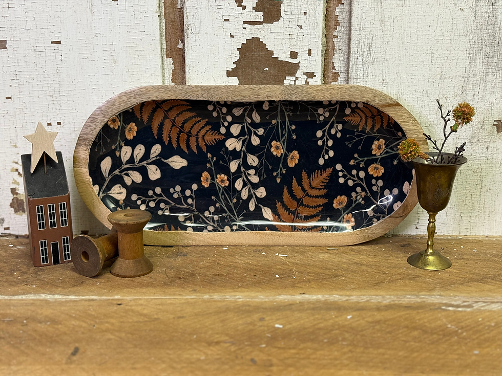 12" x 5" x 1" oval wood tray with patterned enamel inlay of black with flowers & ferns in creams & rusty orange
