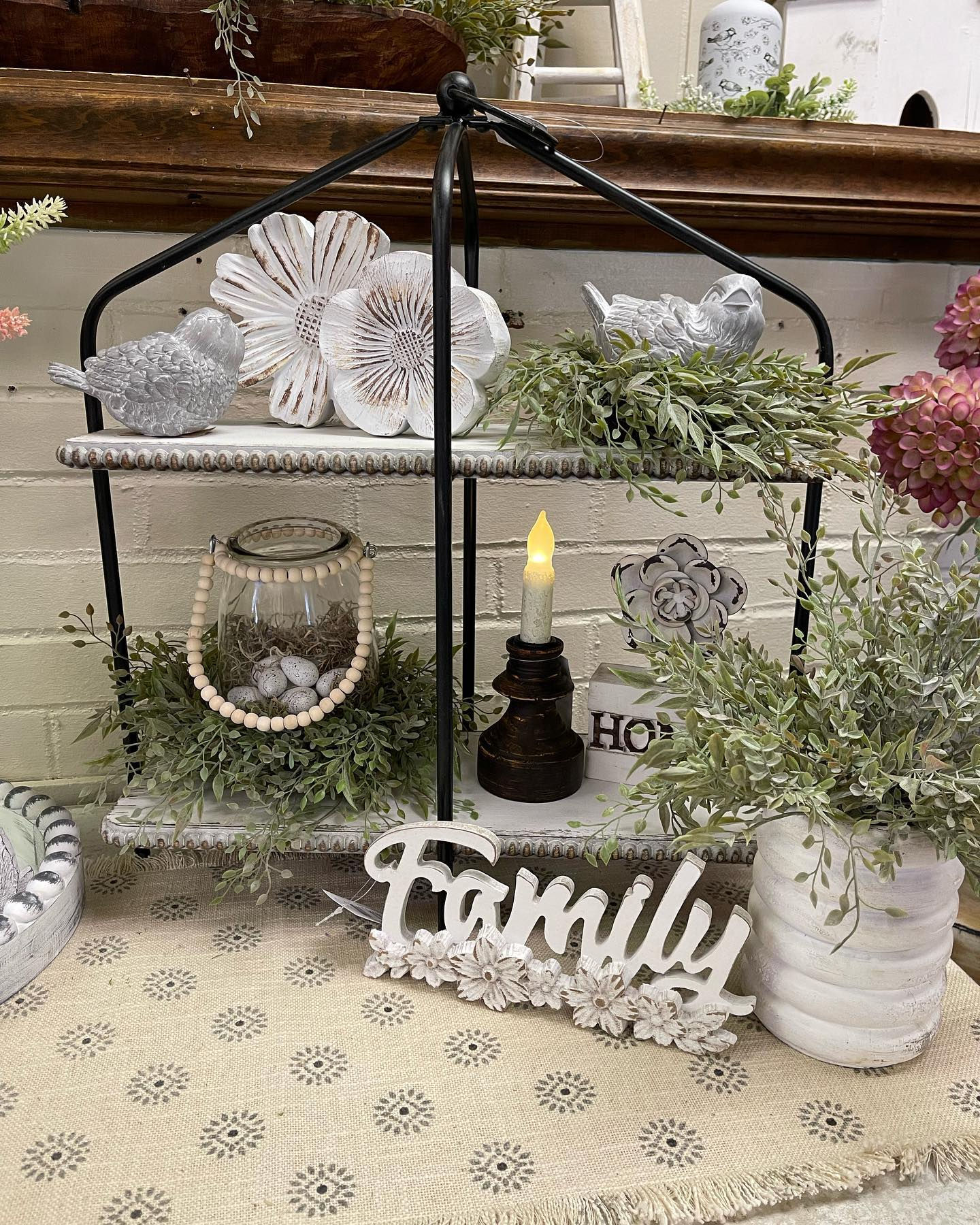 19.5” by 8” by 21.5” Black metal frame and 2 white wood shelves with beaded edge