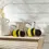 Thumbnail: set of 2 wooden bee sitters, 5.75" & 4.25", painted yellow & black stripes, white wings with black dots, iron antennae