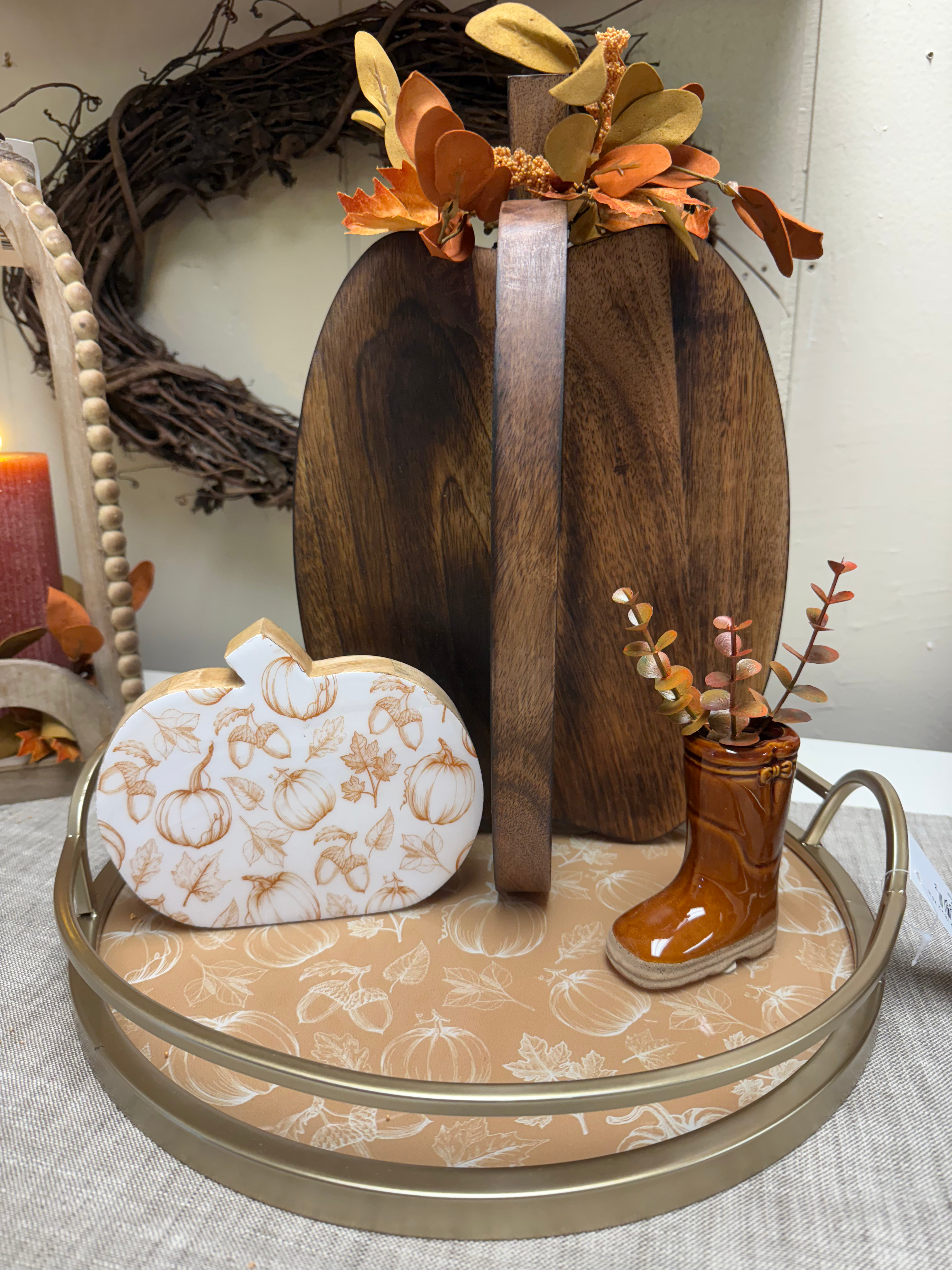 13.5" diameter round tray with soft gold metal frame & handles, insert of golden brown background with fall motifs in cream