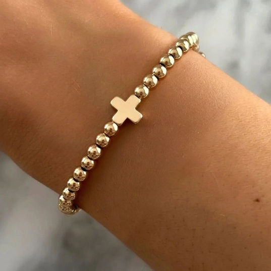 stacking stretch bracelet, 18K gold plated brass beads with a mini gold plated cross bead