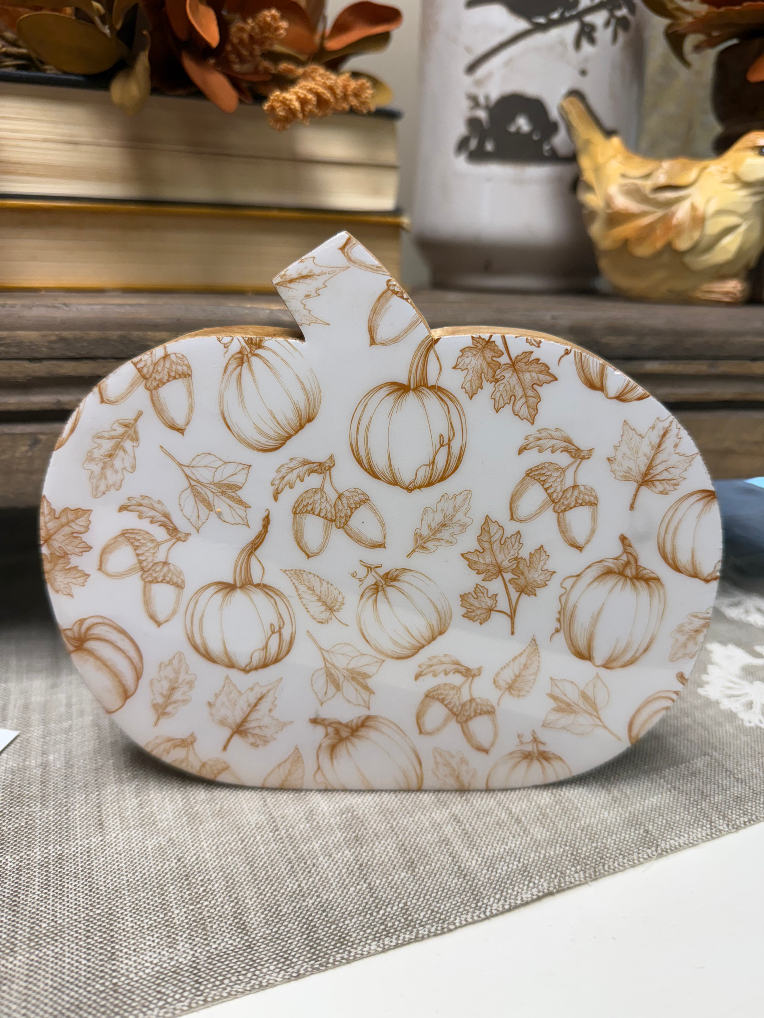 7" x 6" x 1" wood pumpkin block with white enamel front printed with a fall print