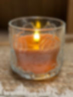 4" x 4" glass jar embossed with pumpkins, jar contains orange wax timer candle, requires 2 AA batteries, 6 hr timer