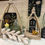 Thumbnail: 10.5” x 10.5” x 15” wood open air lantern in a pyramid shape with wood finial on top