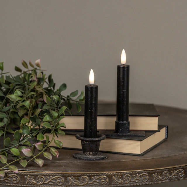 set of 2 5.5" black wax timer tapers, 3D flame, requires AAA battery, 6 hour timer