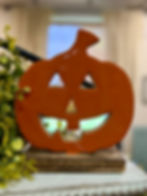 7" x 6" wood jack o' lantern with toothy grin, orange enameled front, wood base for freestanding display