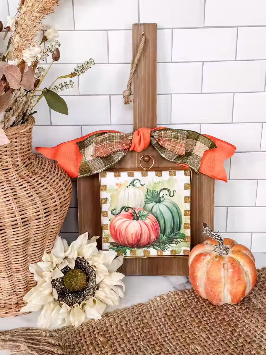 6" x 1" x 7" Round Top Collection print of 3 Pumpkins, gold metal frame, ring on top for hanging