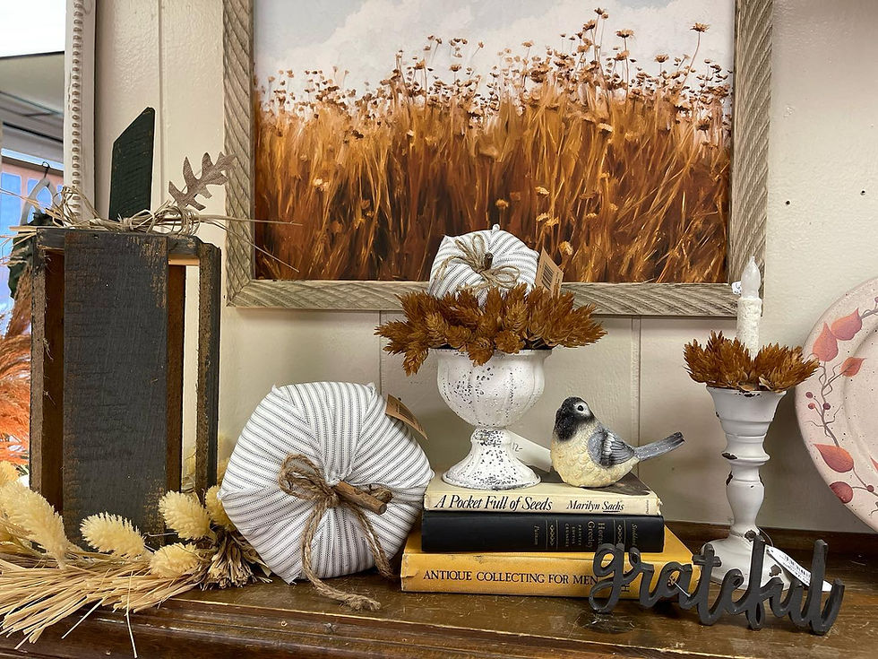 4” x 4.75” stuffed fabric pumpkin, white & black ticking stripe fabric, stick stem, jute bow, raw seams