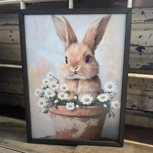 19"x25" print of a soft brown bunny in a aged terracotta clay pot of white daisies, black box frame, sit or hang