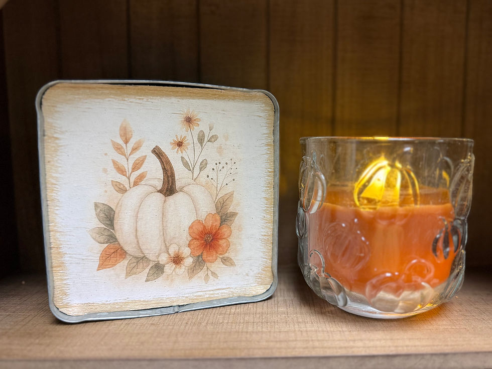 Thumbnail: 4" x 4" glass jar embossed with pumpkins, jar contains orange wax timer candle, requires 2 AA batteries, 6 hr timer