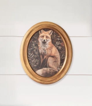 12" H x 10" W print of a fox in William Morris style framed in a gold finish oval wood frame with glass