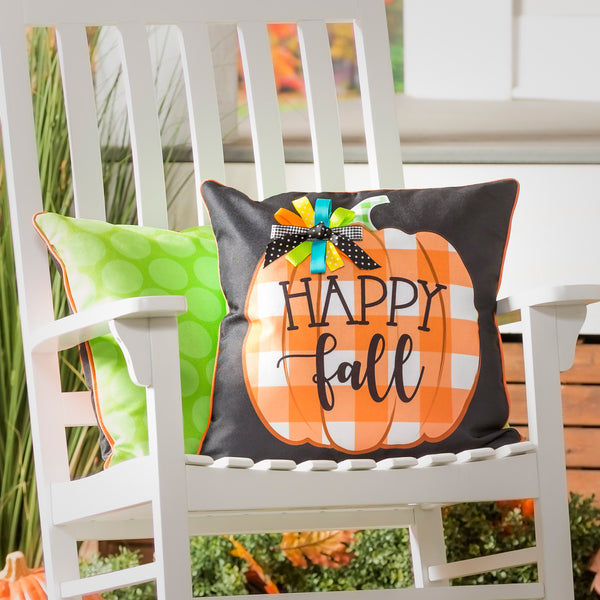 Black pillow cover with a orange and white checked pumpkin that says happy fall printed on the front