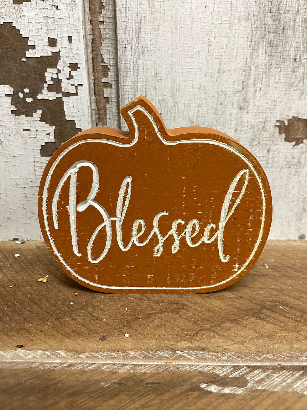 6.3"x5.5"x1" Orange wood block pumpkin with carved βBlessedβ in cream script