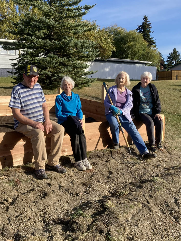 community volunteers cleaning up local park