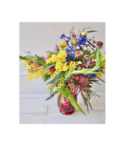 Florists choice mimosa glow bouquet
