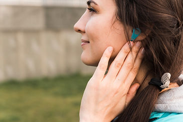 side-view-woman-sportswear-listening-music.jpg