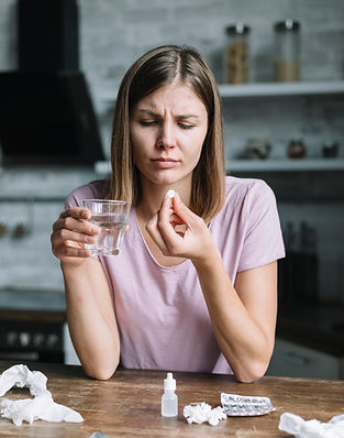 portrait-sick-young-woman-with-glass-water-medicine.jpg