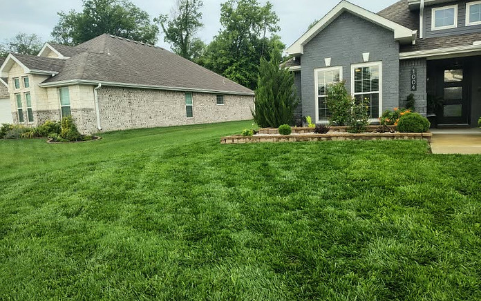 Mowing and weed eating for a residence