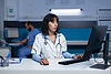 medical-specialist-using-computer-keyboard-night (1).jpg