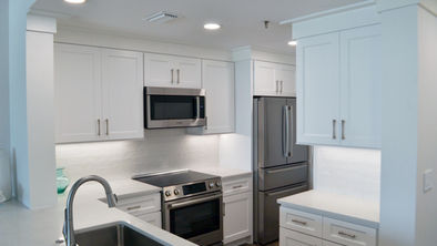 White shaker kitchen cabinets with brass hardware, Medford, OR