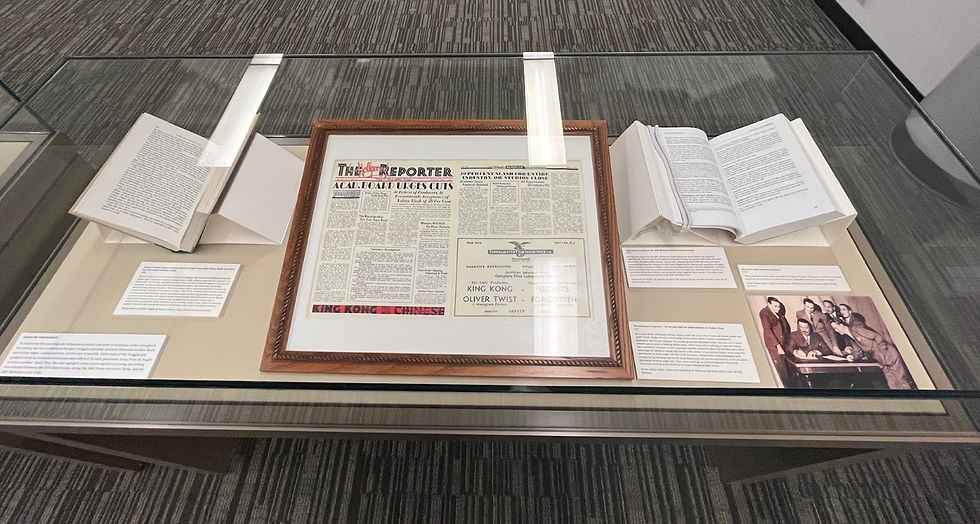 Historical documents and photos detailing reasons behind unionization.
