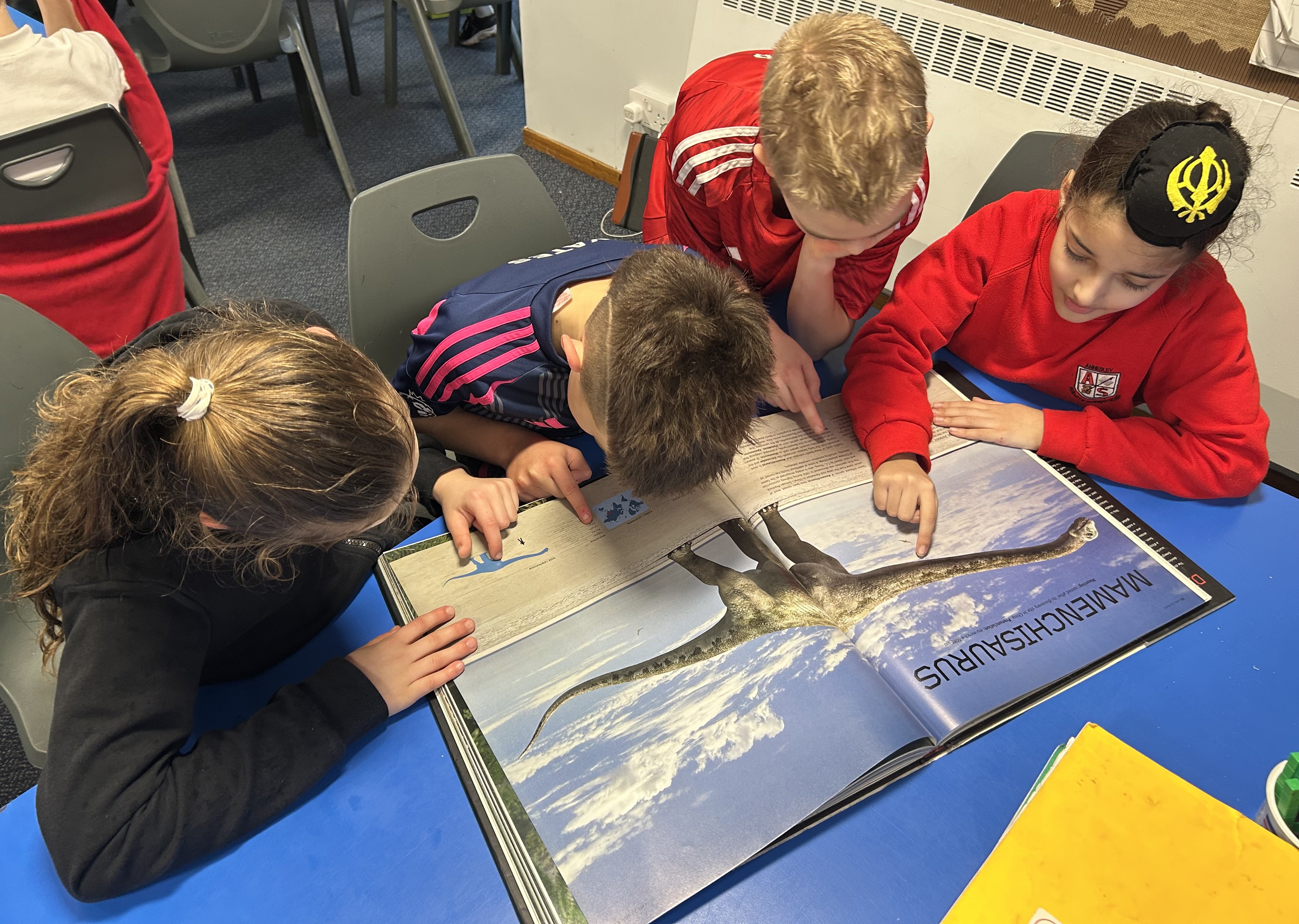 Dinosaur book Tan Ray Iris loki.jpeg