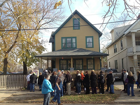 People waiting outside home.JPG