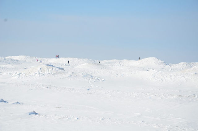 Many others walking on Lake Michigan