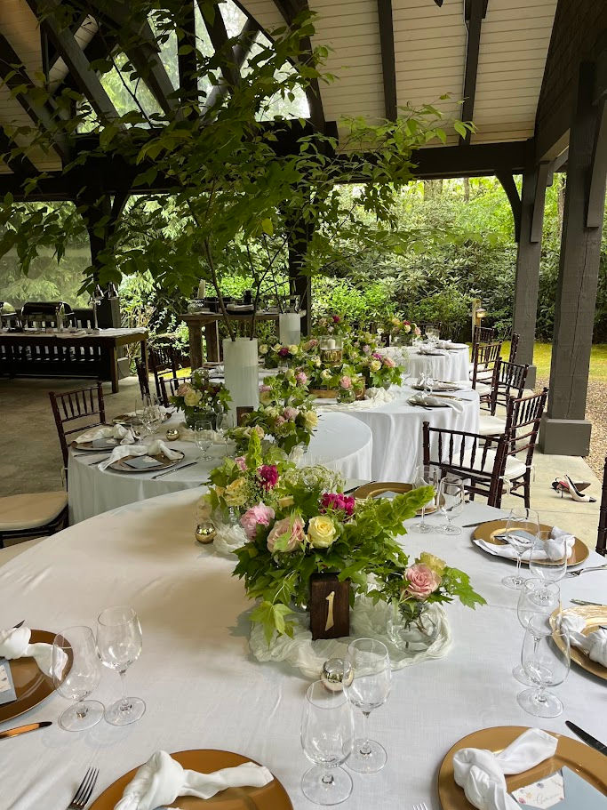 A knotted napkin, a personalized letter, and handmade table numbers kept things cozy.