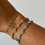 Thumbnail: Evil eye bracelet gold light