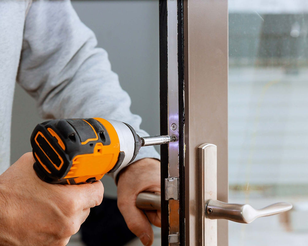 locksmith-in-installing-new-house-door-lock-hand-h-XVHVTG4-1.jpg