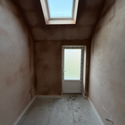 Single detached, part garage conversion in Whitley Bay plastered with Velux window installed.