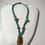 Thumbnail: Designer Turquoise Coral Necklace with Cat Netsuke Carvings