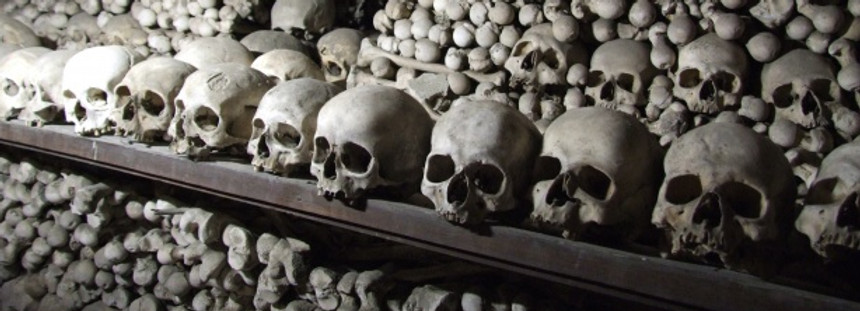 pile-of-human-skulls-and-bones.jpg