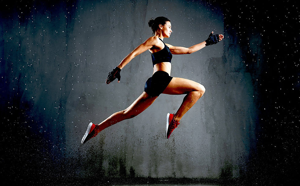 strong-wet-woman-posing-during-jump small size.jpg