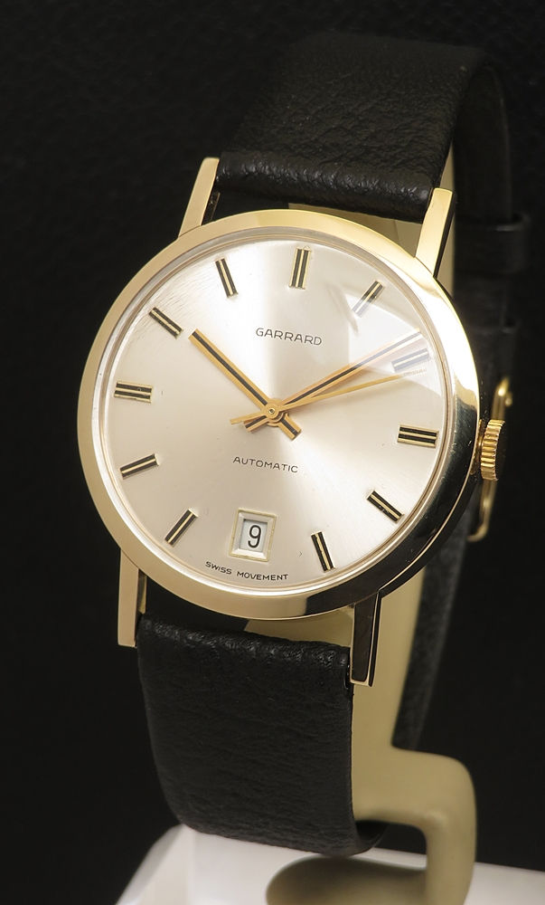 Near Mint Unworn Solid 9ct Gold Garrard Automatic With Box and papers 1977