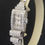 Thumbnail: Platinum Diamond Art Deco Asymmetrical "Wave" Ladies Watch by Universal c1930
