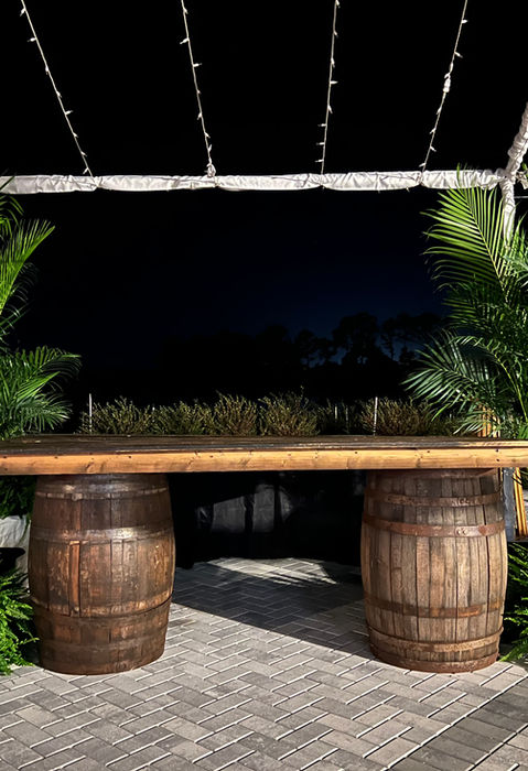 large plant arrangement at an event at night