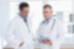 doctor-speaking-with-his-colleague.jpg