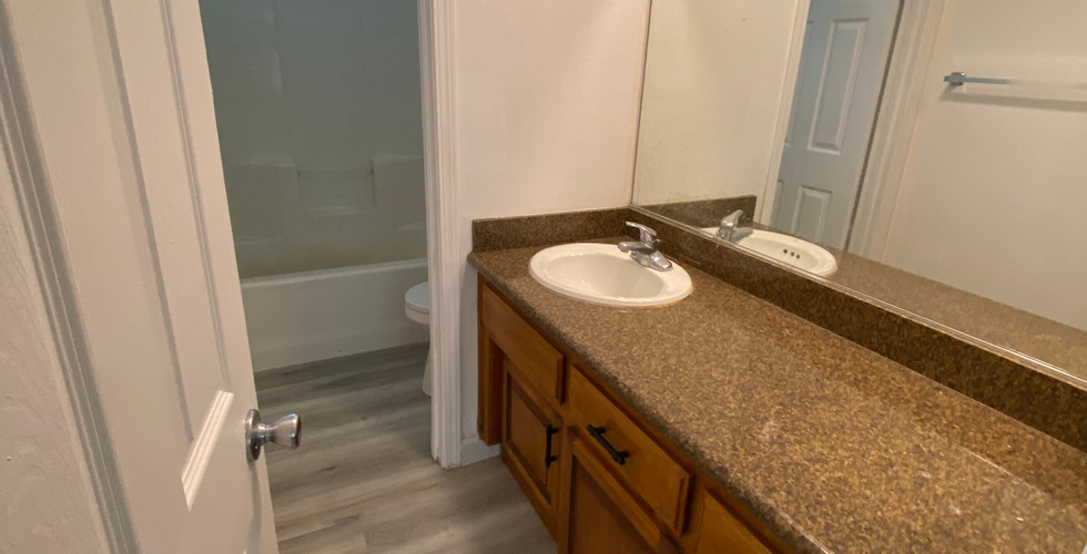First full bathroom with vanity 