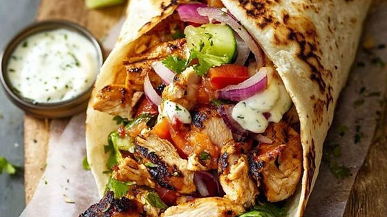 Saj Alkhatoon Chicken wrap comes with fries