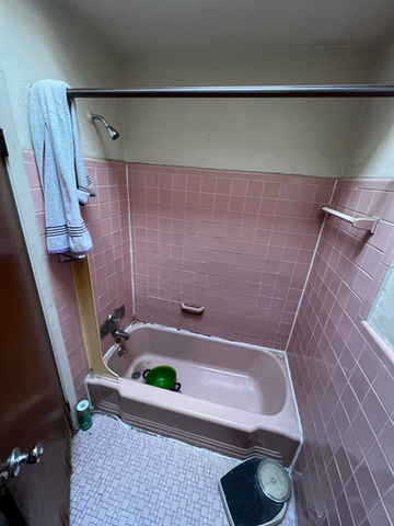 Bathroom with Bathtub and Showerhead