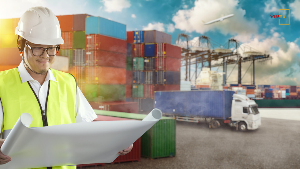 Engineer reviewing port logistics plans in front of container terminals, representing logistics development in Central Vietnam and regional supply chain expansion.