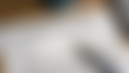 Lease agreement document with pen on desk, illustrating legal advisory leasing contract drafting and review services.