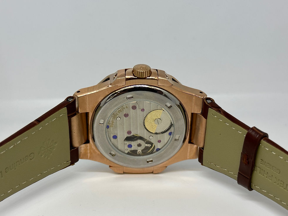 Miniatura: Patek Philippe Nautilus Moon Phase Calendar Rose Gold