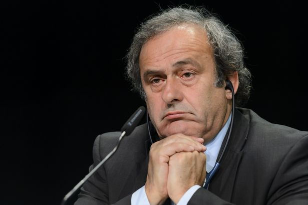 Michel-Platini-gives-a-press-conference-stating-UEFAs-stance-on-FIFA-and-Sepp-Bl