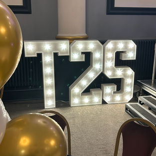 Large LED light up number and letters at corporate charity event at The Corn Exchange in Rochester Kent